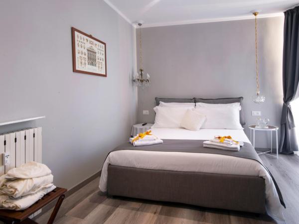 Il Genovino : photo 9 de la chambre chambre triple avec salle de bains privative