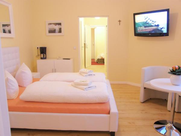 City Guesthouse Pension Berlin : photo 3 de la chambre suite familiale 2 chambres
