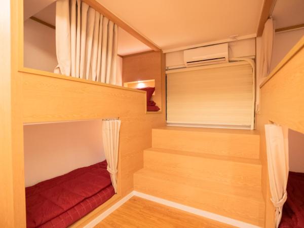 Huayuanhouse HQ in hongdae : photo 7 de la chambre lit dans dortoir pour femmes de 4 lits