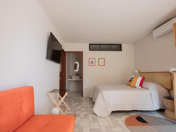 Casa Ixaya by Barrio México : photo 2 de la chambre chambre triple - vue sur jardin