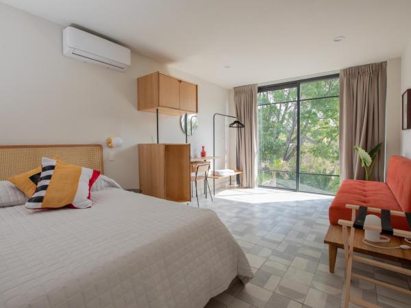 Casa Ixaya by Barrio México : photo 9 de la chambre chambre triple - vue sur jardin