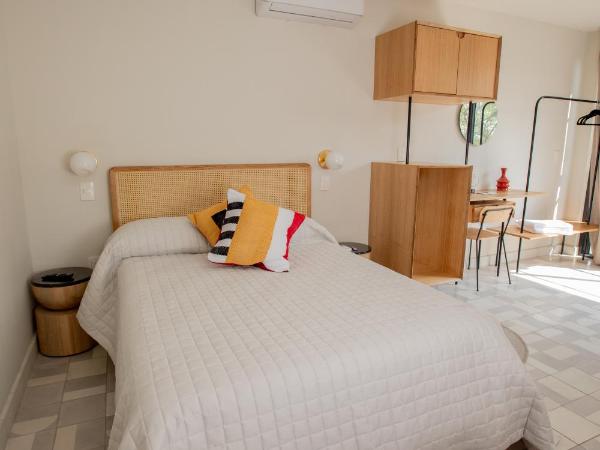 Casa Ixaya by Barrio México : photo 1 de la chambre chambre triple - vue sur jardin