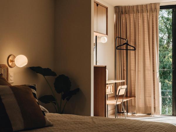 Casa Ixaya by Barrio México : photo 3 de la chambre chambre quadruple - vue sur jardin