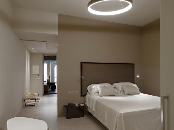 Hotel Villa Belvedere : photo 3 de la chambre suite avec vue sur jardin - dépendance