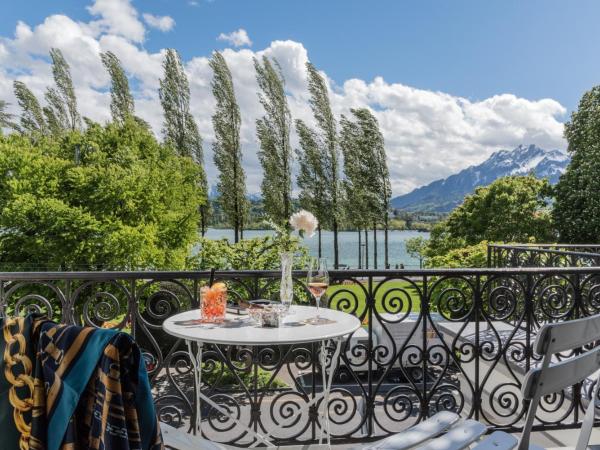 Hotel Beau Séjour Lucerne : photo 1 de la chambre chambre double avec balcon et salle de bains commune