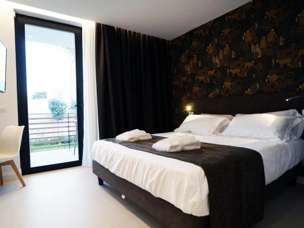 Villa Pina : photo 2 de la chambre chambre double - vue sur jardin