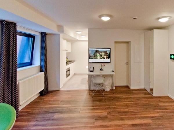 Eco Smart Apartments Nürnberg Süd : photo 3 de la chambre appartement suite confort au sous-sol avec canapé-lit