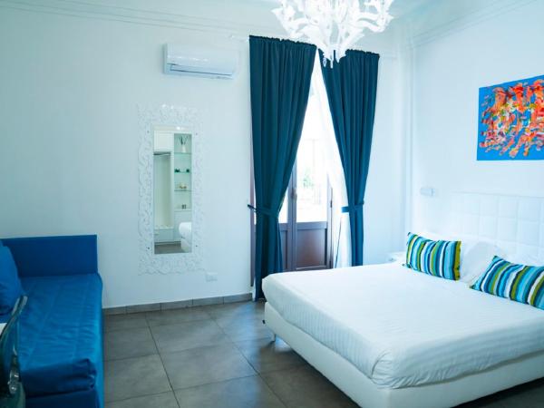 Etna Suite Group : photo 1 de la chambre chambre triple exécutive