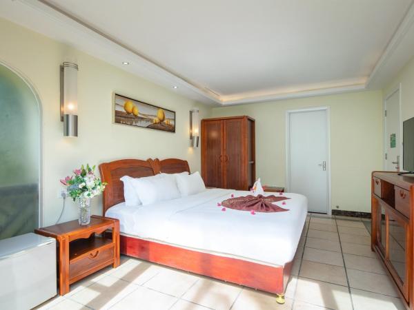 Palm Beach Resort & Spa : photo 3 de la chambre chambre double ou lits jumeaux standard - vue sur jardin