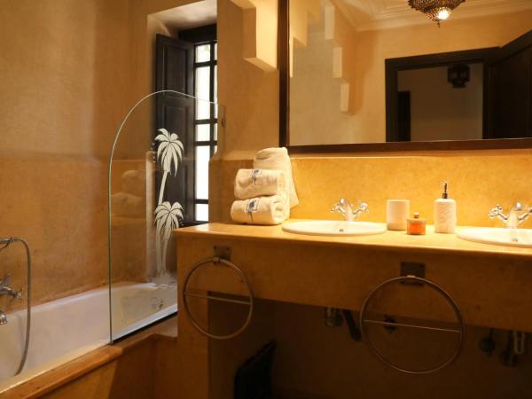 Villa Le Perroquet Bleu : photo 4 de la chambre suite - vue sur jardin