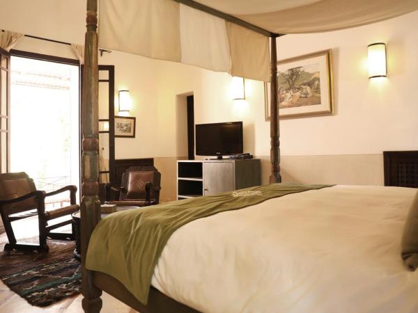 Villa Le Perroquet Bleu : photo 9 de la chambre suite - vue sur jardin