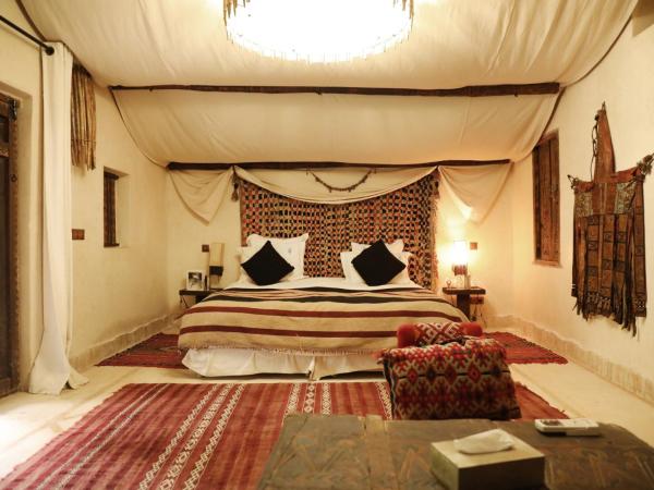 Villa Le Perroquet Bleu : photo 3 de la chambre chambre triple - vue sur la piscine