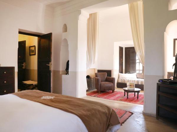 Villa Le Perroquet Bleu : photo 2 de la chambre suite - vue sur jardin