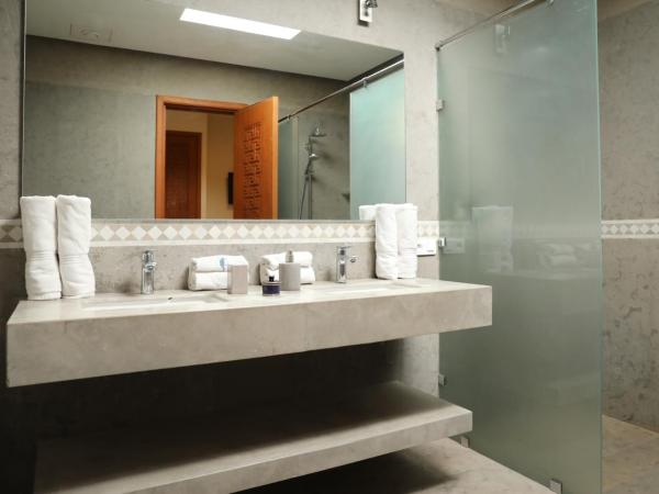 Villa Le Perroquet Bleu : photo 9 de la chambre suite lit queen-size deluxe