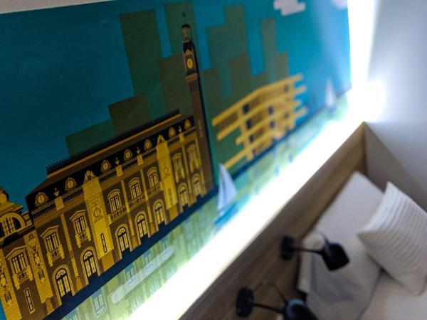 Original Domino House : photo 7 de la chambre chambre lits jumeaux avec salle de bains privative