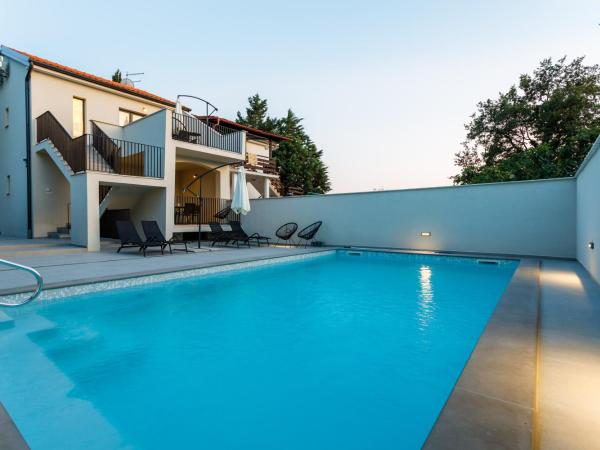Mari House : photo 9 de la chambre appartement - vue sur piscine 