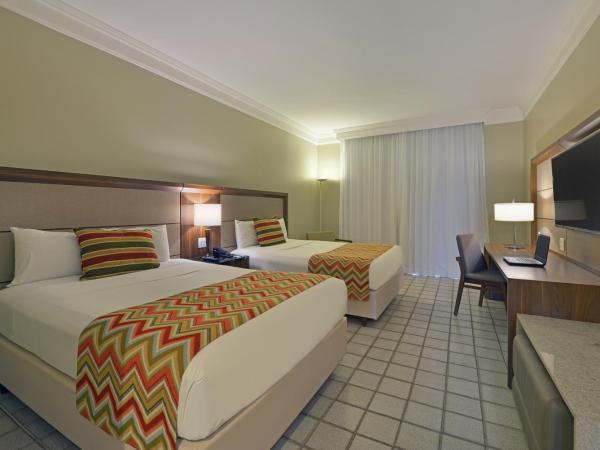 Hotel Deville Prime Salvador : photo 1 de la chambre chambre de luxe avec 2 lits doubles