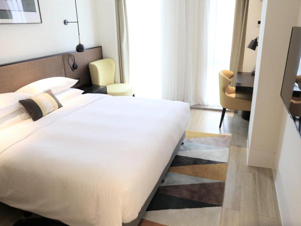 Citadines Gaoke Liangjiang Chongqing : photo 3 de la chambre appartement exécutif 3 chambres