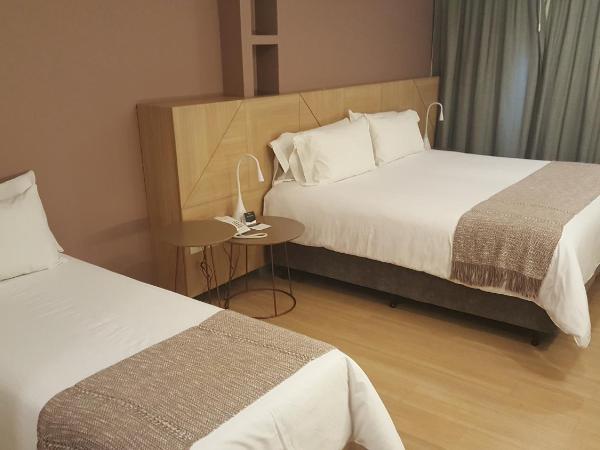 Brizo Salta : photo 1 de la chambre hébergement lit king-size triple supérieur