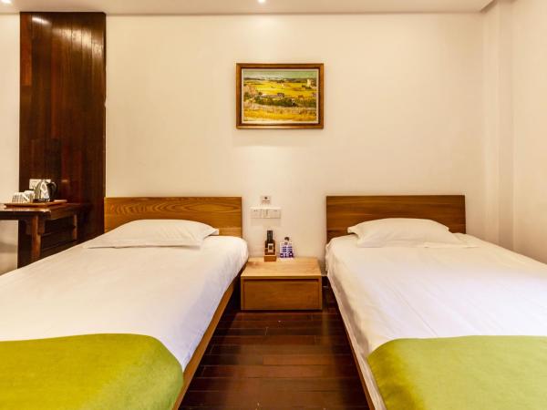 Hofang Guest House : photo 3 de la chambre chambre lits jumeaux standard