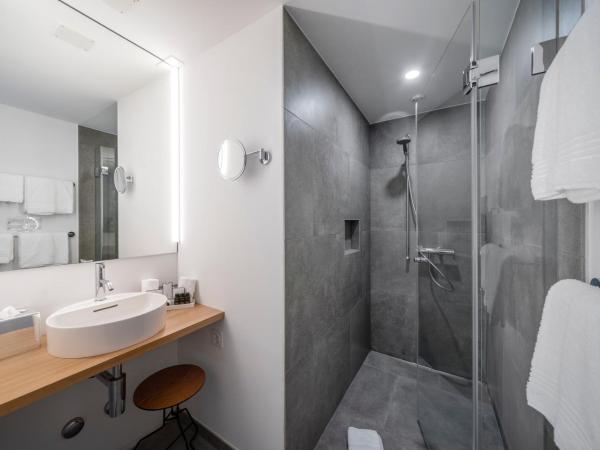 Gast - und Kulturhaus Der Teufelhof Basel : photo 4 de la chambre chambre double design set