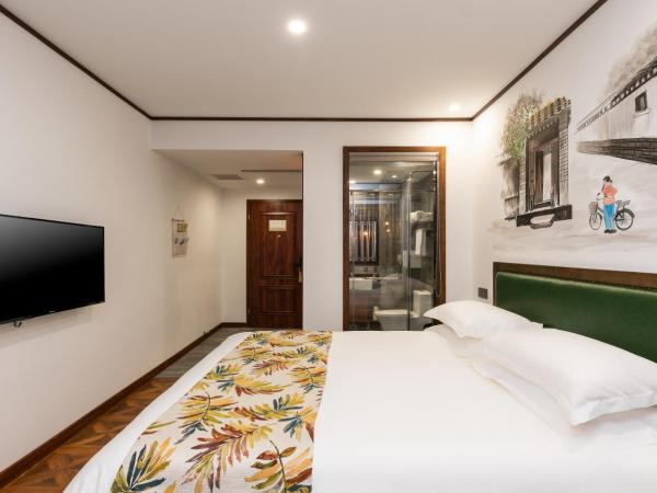 Time Traveller Hotel - Near Prince Gong's Mansion, Beihai Park, Tian'anmen Square, Nanluoguxiang Hutong, Huguosi Hutong Snack Street, 5 minutes walk away from Ping'anli Subway Station, Free ice cream and laundry service,English communication well : photo 1 de la chambre chambre double deluxe