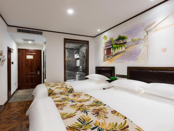 Time Traveller Hotel - Near Prince Gong's Mansion, Beihai Park, Tian'anmen Square, Nanluoguxiang Hutong, Huguosi Hutong Snack Street, 5 minutes walk away from Ping'anli Subway Station, Free ice cream and laundry service,English communication well : photo 1 de la chambre chambre familiale