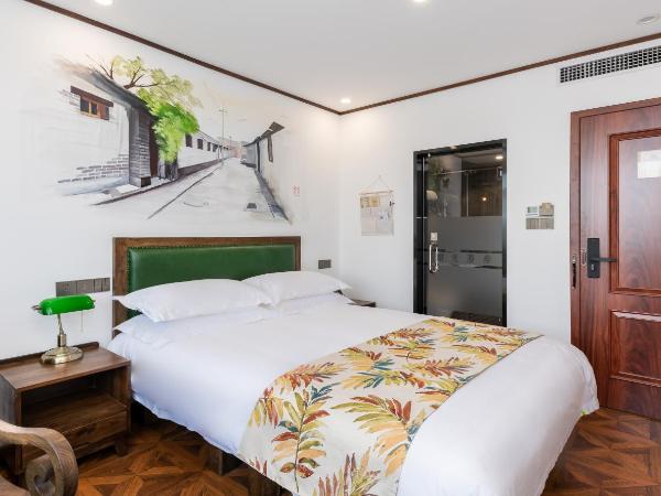 Time Traveller Hotel - Near Prince Gong's Mansion, Beihai Park, Tian'anmen Square, Nanluoguxiang Hutong, Huguosi Hutong Snack Street, 5 minutes walk away from Ping'anli Subway Station, Free ice cream and laundry service,English communication well : photo 5 de la chambre chambre double