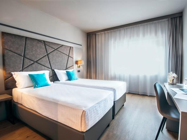 DC HOTEL INTERNATIONAL : photo 4 de la chambre chambre lits jumeaux