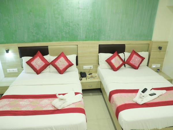 Hotel Plaza Executive - near BKC : photo 1 de la chambre chambre quadruple deluxe