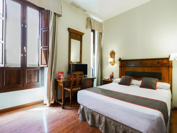 Hotel Plaza Nueva : photo 1 de la chambre chambre double ou lits jumeaux