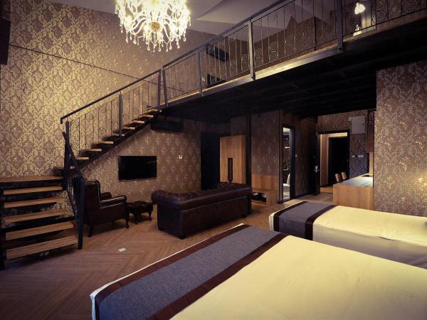 1969 Business Suites : photo 3 de la chambre duplex cozy