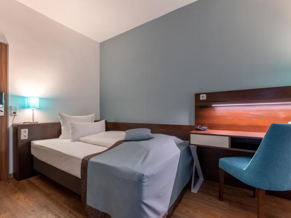 Trip Inn Hotel Messe Westend : photo 1 de la chambre chambre simple