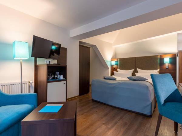 Trip Inn Hotel Messe Westend : photo 1 de la chambre chambre double