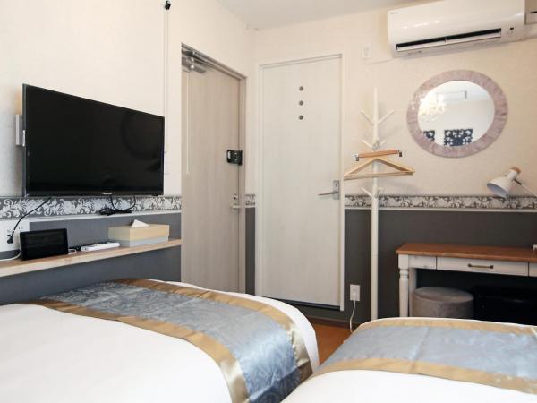 SHINJUKU GLOBAL HOTEL : photo 5 de la chambre chambre lits jumeaux avec douche 