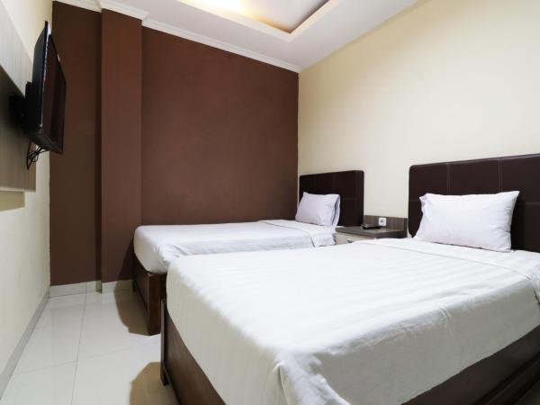 Hotel Istana Bungur : photo 3 de la chambre chambre double ou lits jumeaux supérieure
