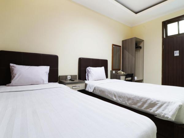 Hotel Istana Bungur : photo 4 de la chambre chambre double ou lits jumeaux supérieure
