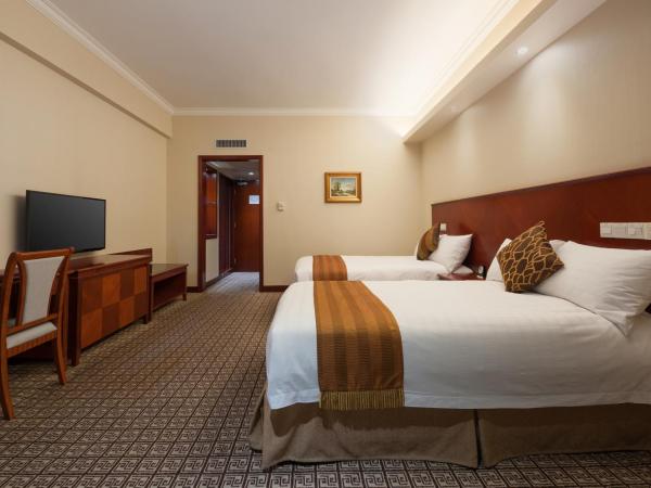 Ramada by Wyndham Pearl Guangzhou-Canton Fair Free Shuttle Bus : photo 4 de la chambre chambre affaires lits jumeaux