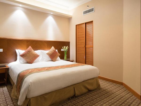 Ramada by Wyndham Pearl Guangzhou-Canton Fair Free Shuttle Bus : photo 3 de la chambre suite affaires