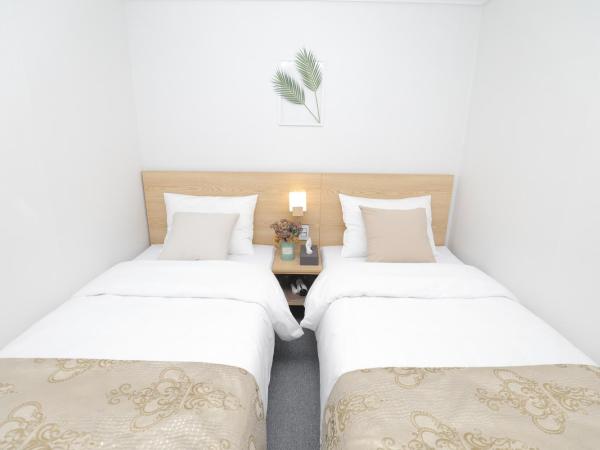 Line Hotel Myeongdong : photo 4 de la chambre chambre lits jumeaux - sans fenêtre