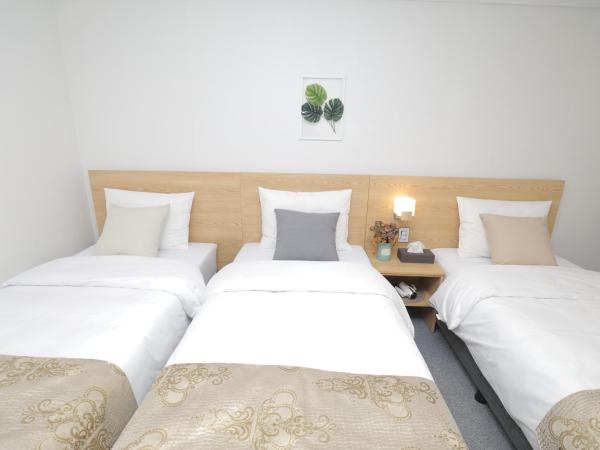 Line Hotel Myeongdong : photo 3 de la chambre chambre triple - sans fenêtre