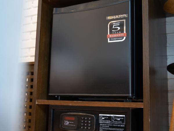 Carnarvon Suites By Reunion : photo 9 de la chambre chambre lit queen-size - vue sur jardin