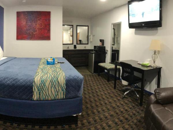 Budget Inn & Suites : photo 2 de la chambre suite exécutive