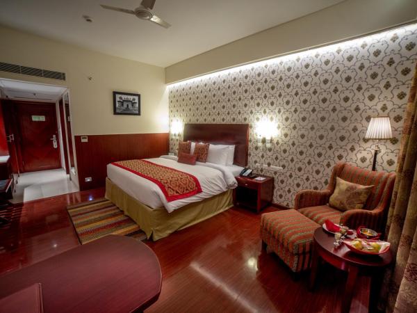 Ramada by Wyndham Jaipur Jaisinghpura : photo 3 de la chambre deluxe king room (non smoking)