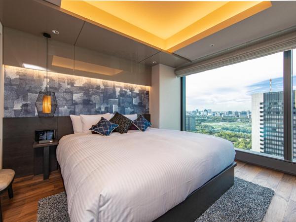 THE BLOSSOM HIBIYA : photo 3 de la chambre suite avec lit king-size