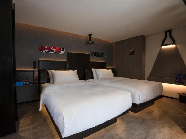 Fenk Attitude Hotel Guangzhou Railway Station : photo 4 de la chambre chambre lits jumeaux deluxe