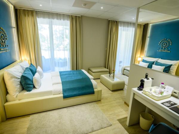 The Hotel Unforgettable - Hotel Tiliana by Homoky Hotels & Spa : photo 5 de la chambre suite avec terrasse