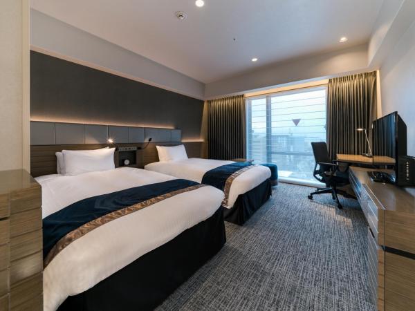Daiwa Roynet Hotel Kyoto Terrace Hachijo PREMIER : photo 1 de la chambre chambre lits jumeaux de luxe avec vue sur la ville - non-fumeurs