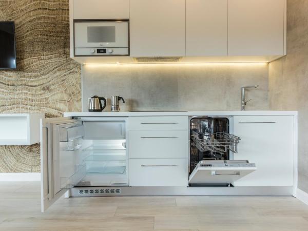 Royal Hill Residence : photo 9 de la chambre appartement 1 chambre avec balcon et vue sur les montagnes