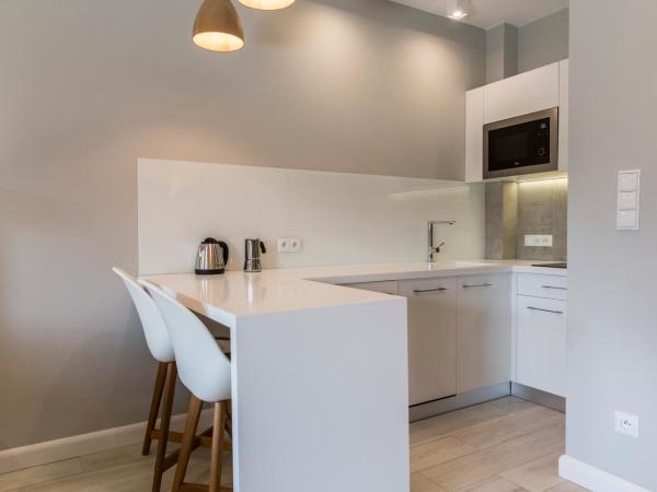 Royal Hill Residence : photo 8 de la chambre appartement en duplex - vue sur montagne